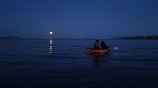 Moonlight paddle on san francisco bay on a kayak