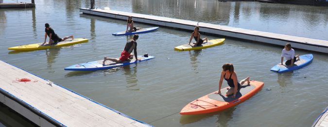 Stand Up Paddleboard Yoga Season Is Here!