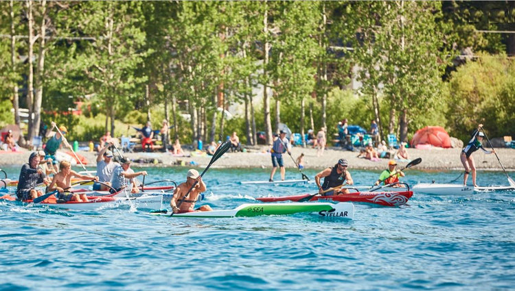 Paddle racing on lake tahoe on SUP Surfski and outrigger canoe