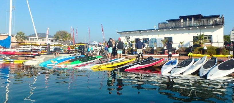 Stand up paddleboards lined up and ready to race on San Francisco Bay