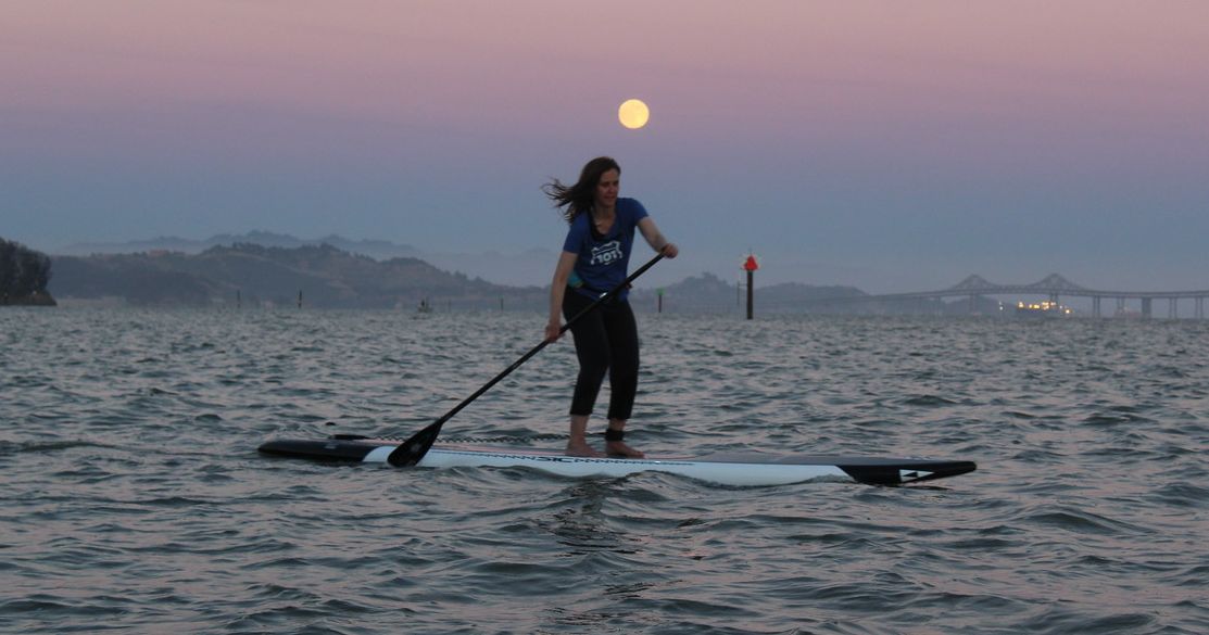 Paddleboarding under the full moon on San Francisco Bay