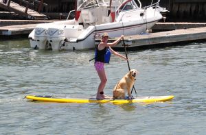 paddler and dog