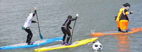 Stand up paddleboarding around a panda head