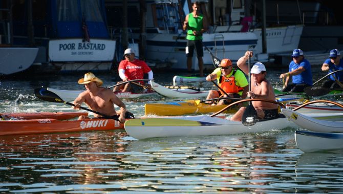 Surfski's, Outrigger Canoes, and kayaks head off the line to race on San Francisco Bay