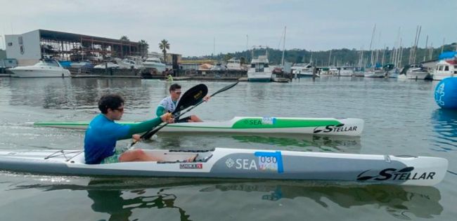 Zach and Petri Alva coming in hot at the finish line of our kayak paddle race