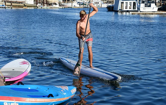 Trevor Tunnington paddling a prone paddleboard