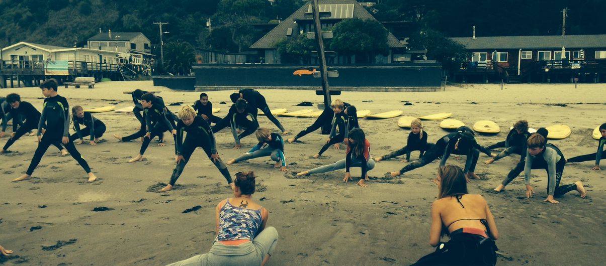 Kids warming up at Surf Camps Stinson Beach